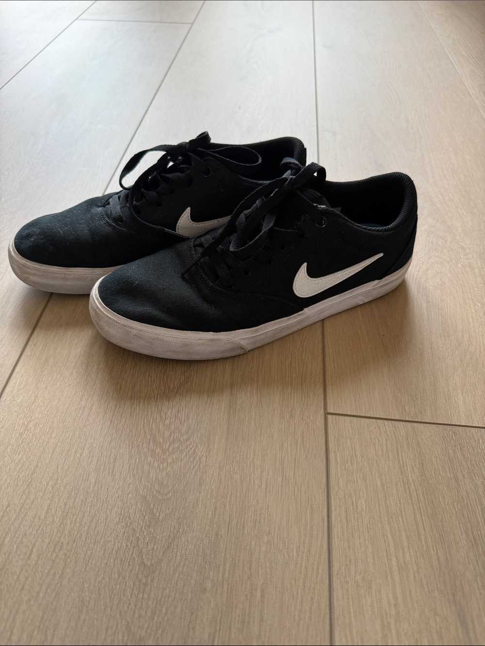 Nike Black Sneakers with White Swoosh
